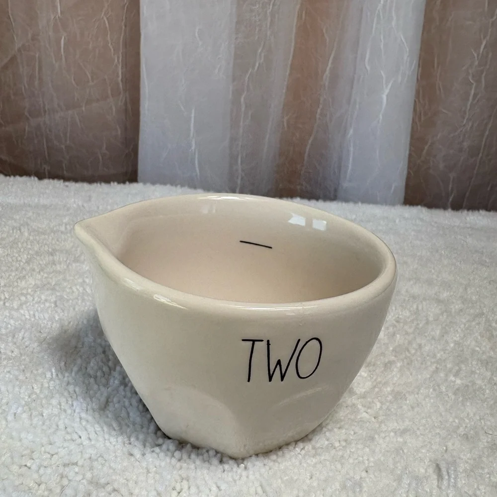 Rae Dunn Artisan Collection Measuring Cups. 4-Piece Set of White Ceramic Cups.